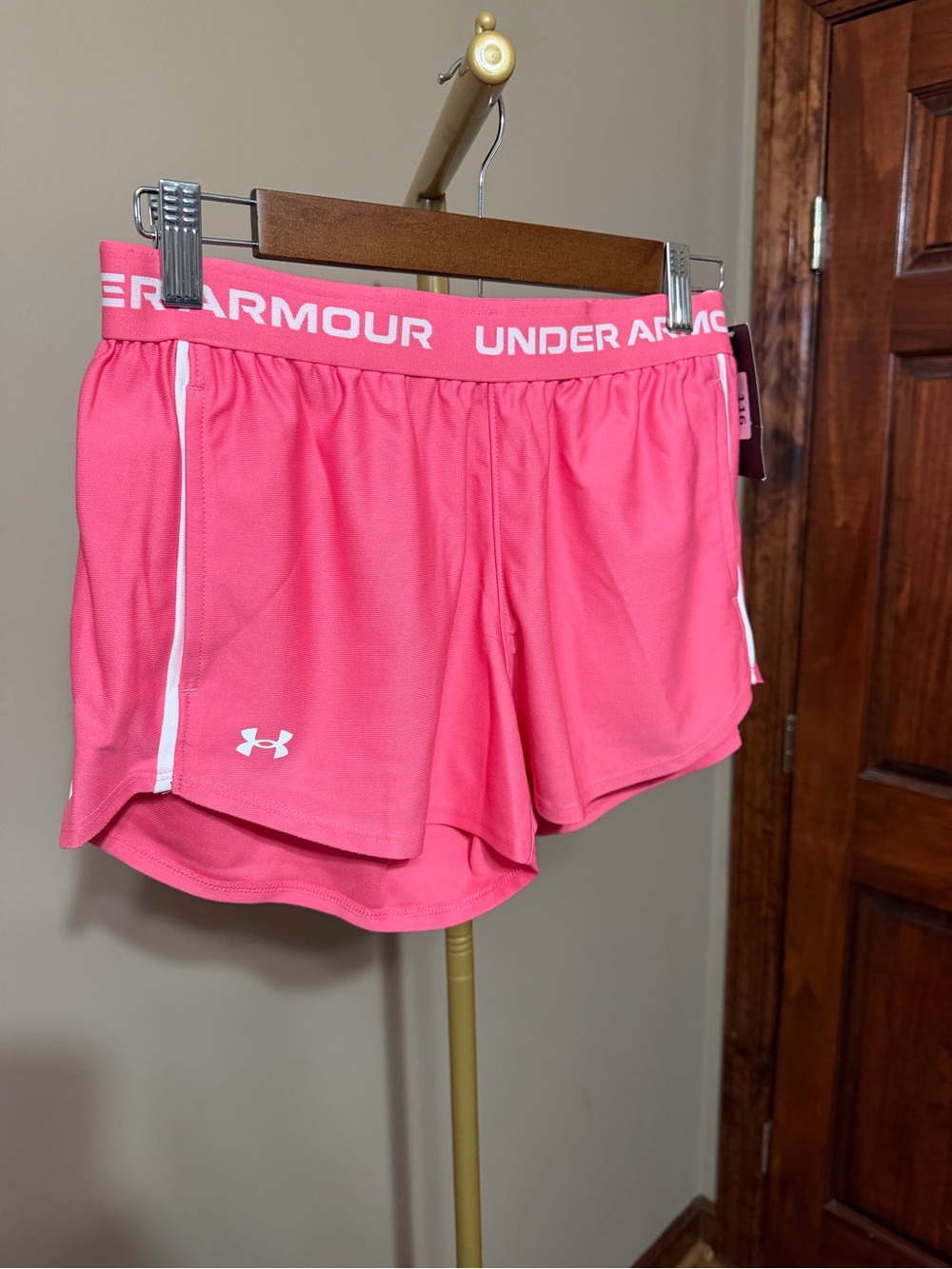 Under Armour Women’s Coral Pink Athletic Shorts with White Trim